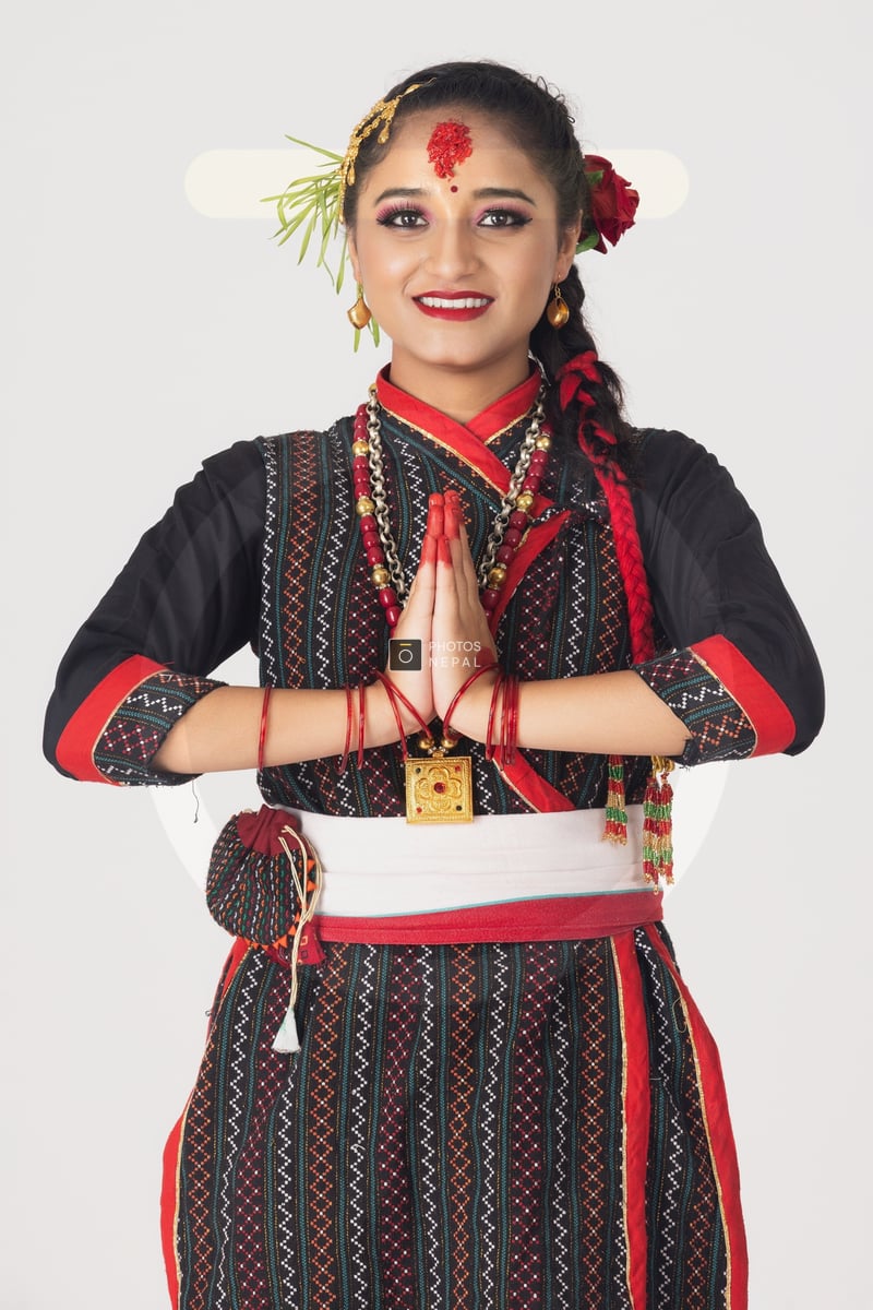 A traditional Newari girl doing Namaste and celebrating Dashain ...