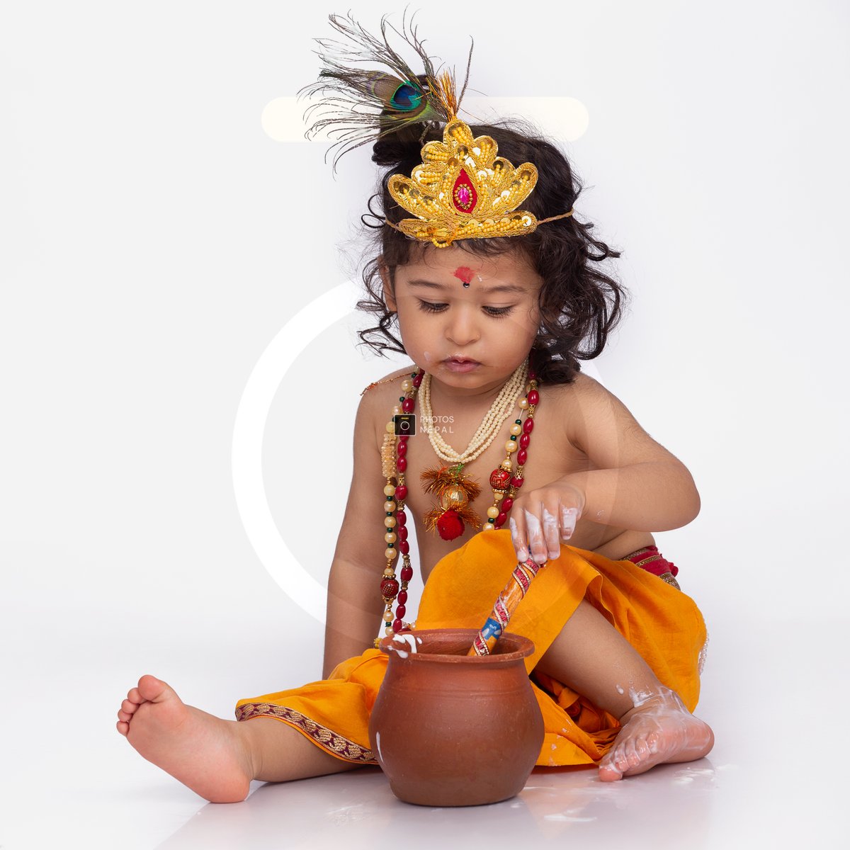 Adorable Indian Kid Dressed as Little Krishna Eating Curd Butter ...