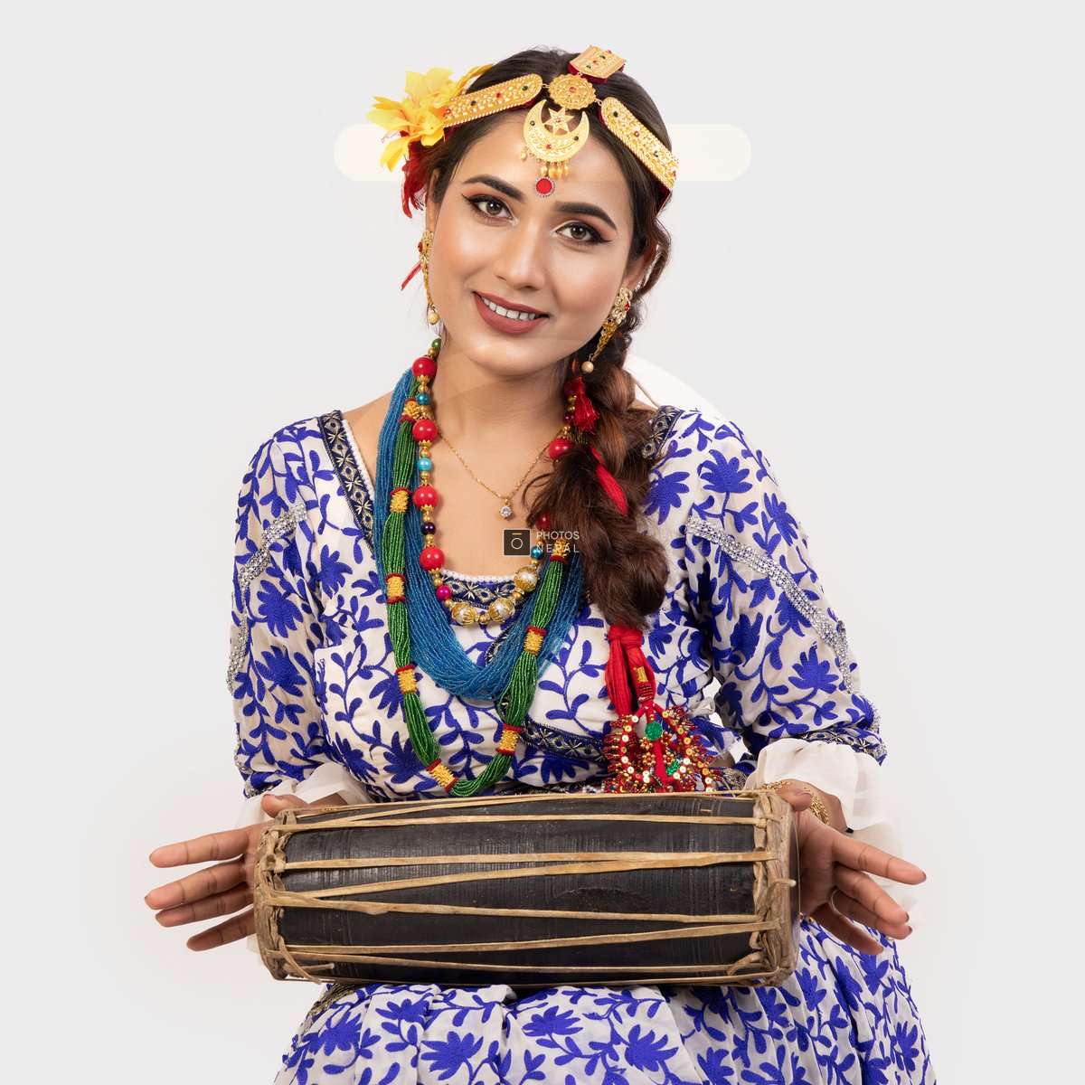 Nepali girl playing Madal during Tihar festival in traditional attire ...