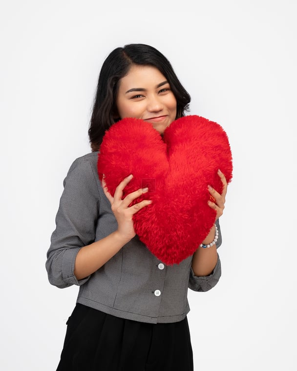 Nepali Lady with HeartShaped Pillow Romantic Stock Image for