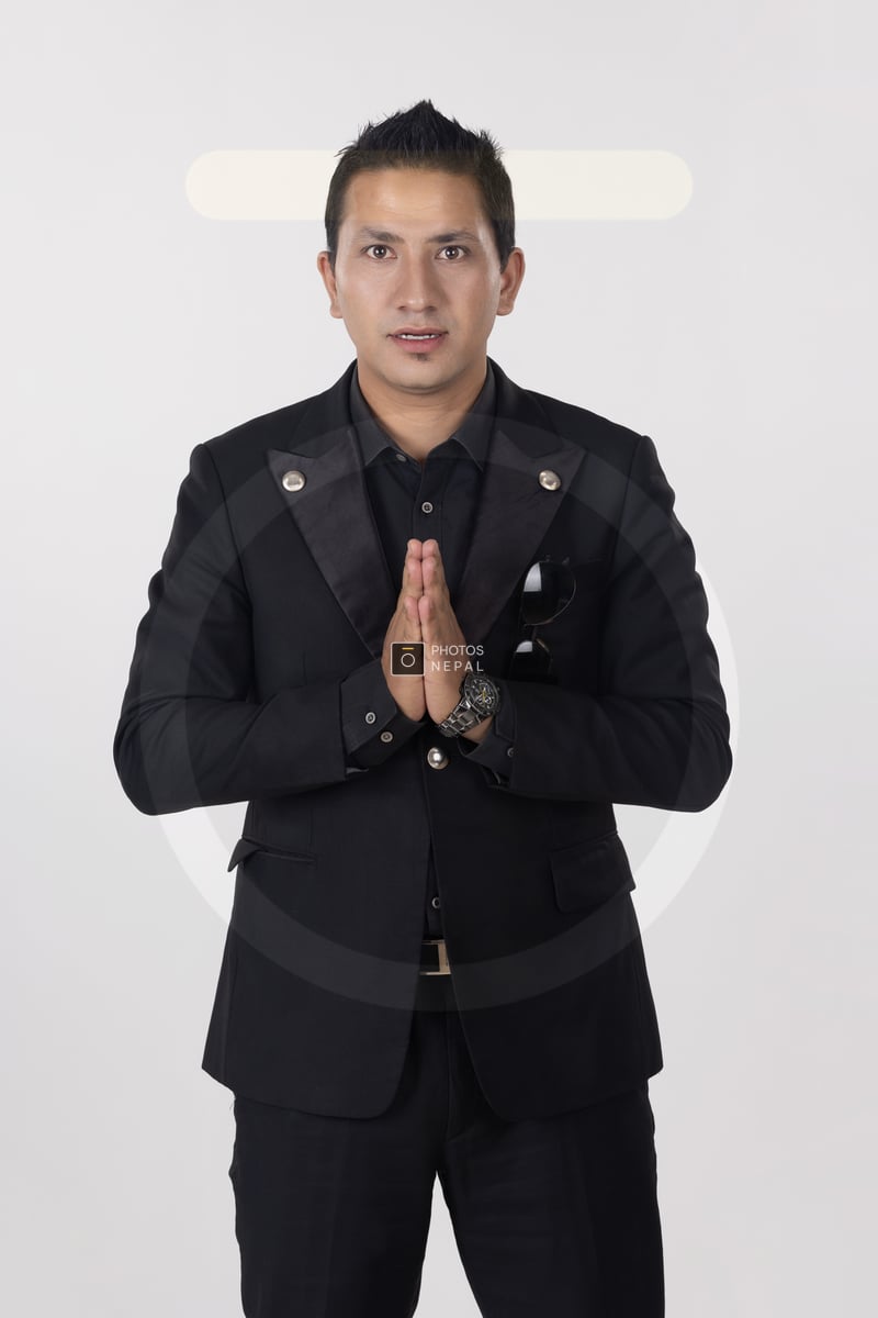 Professional Nepali Businessman Doing Namaste in Black Formal Dress - Photos Nepal Professional Nepali Businessman Doing Namaste in Black Formal Dress - Photos Nepal