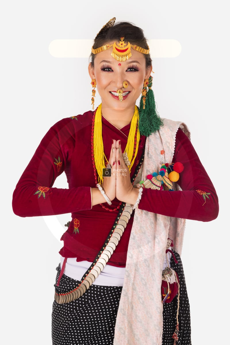 Respectful Rai girl doing Namaste in traditional attire - Photos Nepal