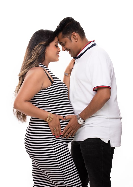 Romantic Nepali Couple Embracing Belly in Maternity Photoshoot Photos