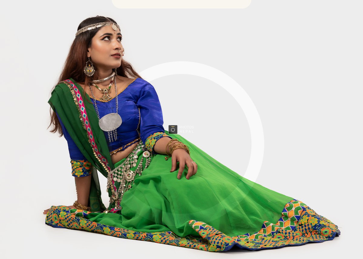 Side Looking Studio Pose of Young Rajasthani Woman in Traditional Dress and Jewelry - Photos Nepal Side Looking Studio Pose of Young Rajasthani Woman in Traditional Dress and Jewelry - Photos Nepal