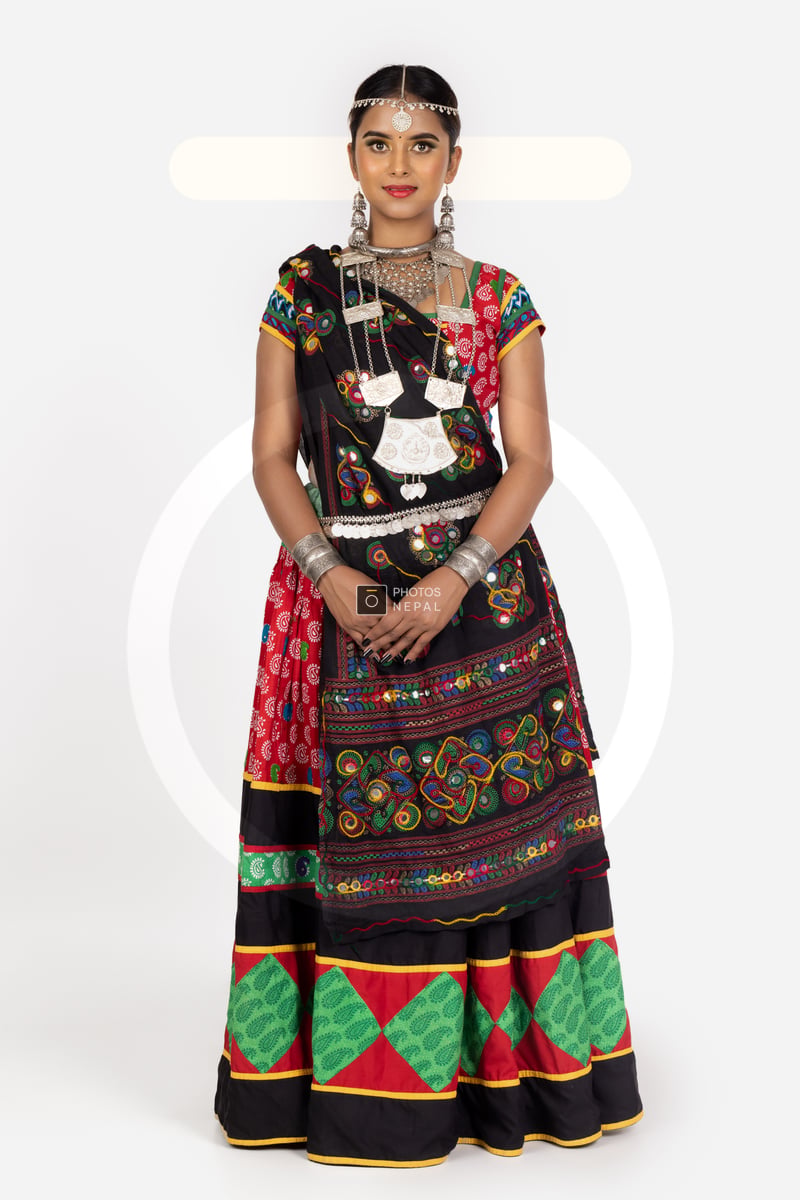 Standing Tharu Girl in Traditional Tharu Attire - Photos Nepal