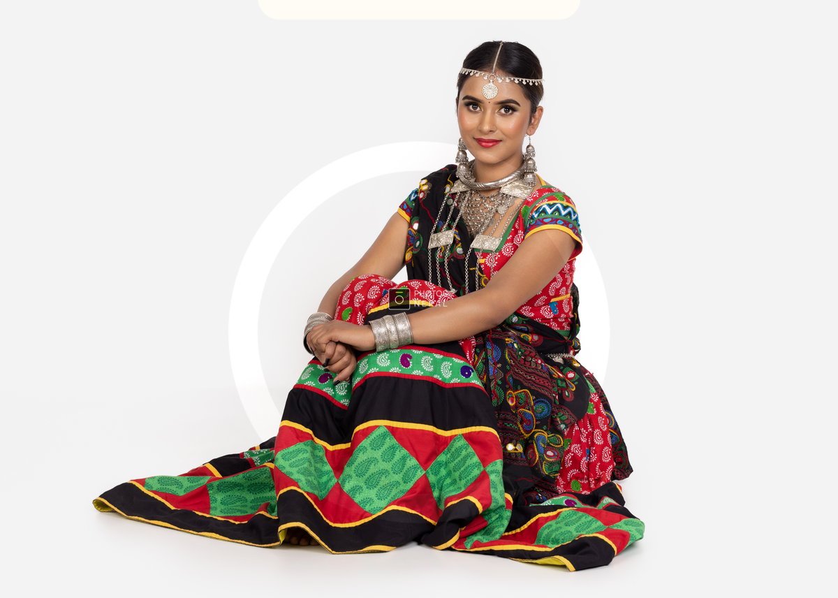 Tharu Visual Raya Traditional Tharu Dress, Graceful Pose on White Background - Photos Nepal