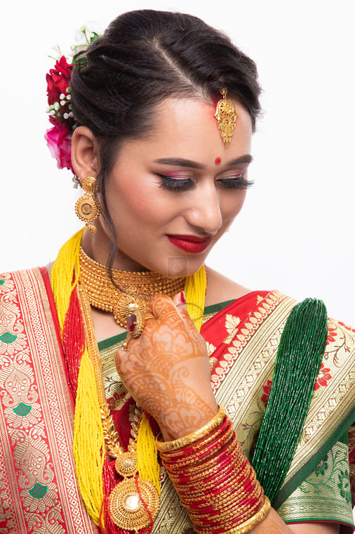A Beautiful and Smiling Nepalese Bride showing her Rani Har - Photos Nepal