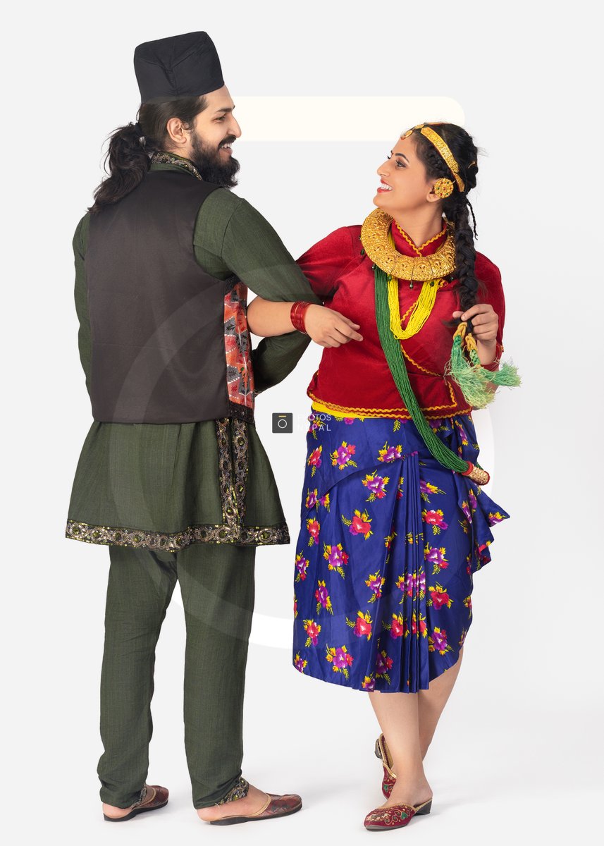 Traditionally Traditionally dressed Nepali couple dancing - Photos Nepal