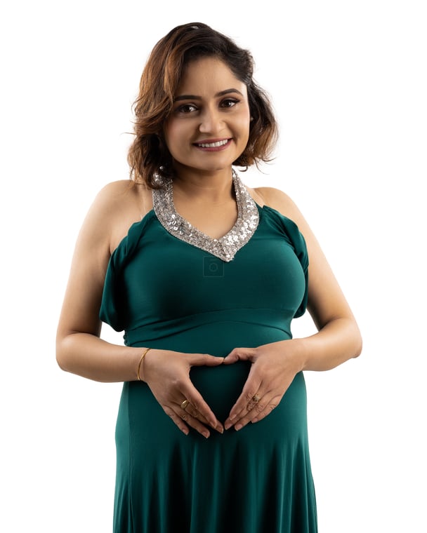 Gorgeous Maternity Photoshoot with Pregnant Woman in Green Gown Making  Heart Shape - Photos Nepal