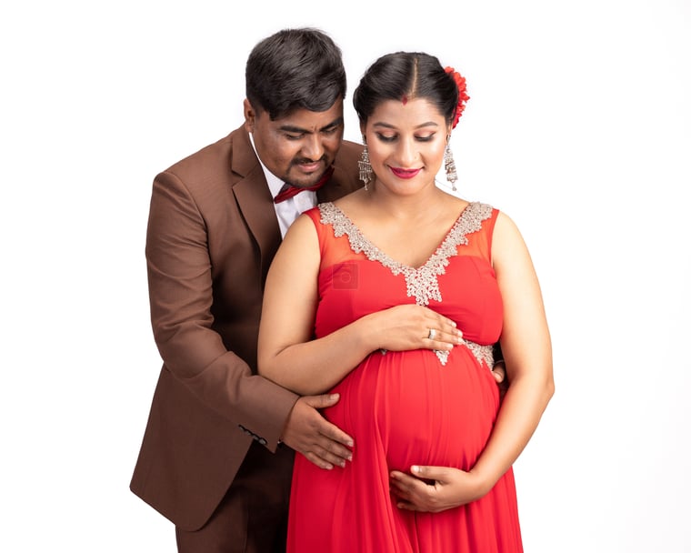 Maternity Photoshoot of Husband and Pregnant Wife Standing Together