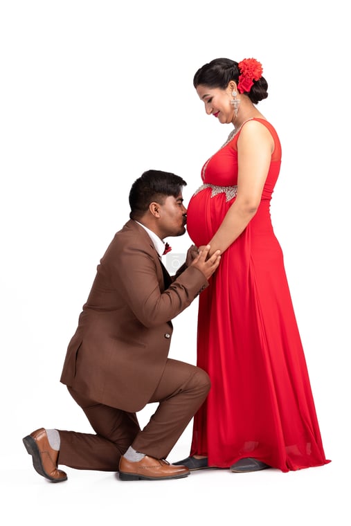 Nepali Husband Kissing His Pregnant Wife's Belly in a Heartfelt Moment